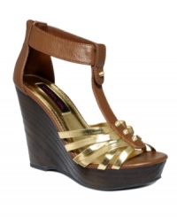 High hopes. Material Girl's Tyler sandals amp up any look with a sultry T-strap, metallic details, and towering wooden wedge. High hopes. Material Girl's Tyler sandals amp up any look with a sultry T-strap, metallic details, and towering wooden wedge.