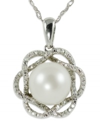 Elegance is always in season, just like this sterling silver necklace which features a cultured freshwater pearl (9-10 mm) and round-cut diamond (1/10 ct. t.w.) flower pendant. Approximate length: 18 inches. Approximate drop length: 7/8 inch. Approximate drop width: 5/8 inch. Elegance is always in season, just like this sterling silver necklace which features a cultured freshwater pearl (9-10 mm) and round-cut diamond (1/10 ct. t.w.) flower pendant. Approximate length: 18 inches. Approximate drop length: 7/8 inch. Approximate drop width: 5/8 inch.