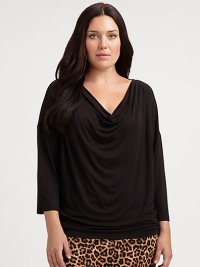 You will find this cowlneck top super flattering, thanks to its relaxed-yet-feminine fit and a hint of stretch. CowlneckThree-quarter sleevesPull-on styleAbout 29 from shoulder to hem95% rayon/5% spandexMachine washImported You will find this cowlneck top super flattering, thanks to its relaxed-yet-feminine fit and a hint of stretch. CowlneckThree-quarter sleevesPull-on styleAbout 29 from shoulder to hem95% rayon/5% spandexMachine washImported