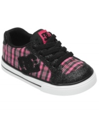 Pretty plaid on these Chelsea sneakers from DC Shoes add an adorable twist to her street style. Pretty plaid on these Chelsea sneakers from DC Shoes add an adorable twist to her street style.