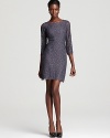 A ladylike DIANE von FURSTENBERG lace dress is ever-so chic for cocktails with an alluring v back and chic scalloped trim.