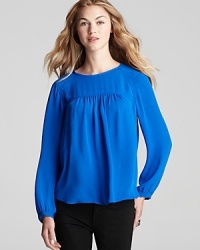 Bring vivid color to your workday wardrobe with this electric-hued gathered Rebecca Taylor blouse. Bring vivid color to your workday wardrobe with this electric-hued gathered Rebecca Taylor blouse.