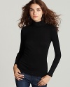 Super comfortable and a perfect addition to any wardrobe, this chic turtleneck is rendered in a luxuriously soft blend of Supima cotton and modal. Wear with leggings or skinny jeans for a streamlined silhouette.
