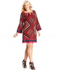 Flaunt a spirited print with One World's three-quarter sleeve plus size dress-- it's a must-get! Flaunt a spirited print with One World's three-quarter sleeve plus size dress-- it's a must-get!