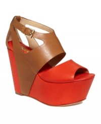 Bring a little retro charm with the Tintle wedges by Report Signature. A peep toe and two-tone leather offer on-trend detailing. Bring a little retro charm with the Tintle wedges by Report Signature. A peep toe and two-tone leather offer on-trend detailing.