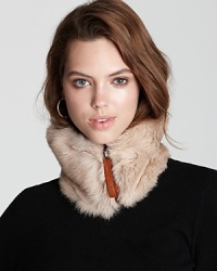 With an oversized suede zipper, Catherine Parra's fur neckwarmer is a statement-making piece to stay warm. With an oversized suede zipper, Catherine Parra's fur neckwarmer is a statement-making piece to stay warm.
