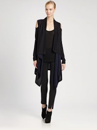 Luxurious double-faced jersey, styled in a reversible draped-front silhouette.Open shouldersLong sleevesOpen frontAsymmetric hemAbout 38 from shoulder to hem85% viscose/15% silkDry cleanImported of Italian fabricModel shown is 5'11 (180cm) wearing US size Small. Luxurious double-faced jersey, styled in a reversible draped-front silhouette.Open shouldersLong sleevesOpen frontAsymmetric hemAbout 38 from shoulder to hem85% viscose/15% silkDry cleanImported of Italian fabricModel shown is 5'11 (180cm) wearing US size Small.