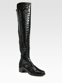 Head-turning boot of crocodile-embossed patent leather with an elasticized back panel for easy on and off access. Stacked heel, 1¾ (45mm)Shaft, 21Leg circumference, 13Crocodile-print patent leather with back elastic panelingPull-on styleLeather liningRubber solePadded insoleImported Head-turning boot of crocodile-embossed patent leather with an elasticized back panel for easy on and off access. Stacked heel, 1¾ (45mm)Shaft, 21Leg circumference, 13Crocodile-print patent leather with back elastic panelingPull-on styleLeather liningRubber solePadded insoleImported