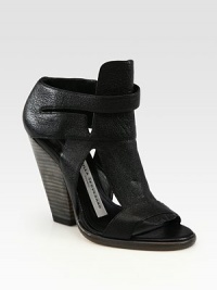 Pebbled leather cutout design with an extended tongue and a towering stacked heel. Stacked heel, 5 (125mm)Leather upperLeather lining and solePadded insoleImportedOUR FIT MODEL RECOMMENDS ordering one size up as this style runs small. Pebbled leather cutout design with an extended tongue and a towering stacked heel. Stacked heel, 5 (125mm)Leather upperLeather lining and solePadded insoleImportedOUR FIT MODEL RECOMMENDS ordering one size up as this style runs small.