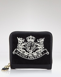 Soft velour cushions your cash in Juicy Couture style. Soft velour cushions your cash in Juicy Couture style.