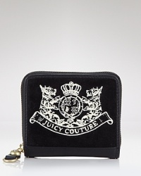 Soft velour cushions your cash in Juicy Couture style.