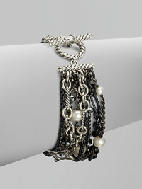 From the Pearl Collection. This chic style features lustrous pearls, sleek hematite accented sterling silver and blacked sterling silver link chains in a multi-row design. Sterling silver & blackened sterling silverCultured freshwater pearlsHematiteToggle closureLength, about 7Imported From the Pearl Collection. This chic style features lustrous pearls, sleek hematite accented sterling silver and blacked sterling silver link chains in a multi-row design. Sterling silver & blackened sterling silverCultured freshwater pearlsHematiteToggle closureLength, about 7Imported