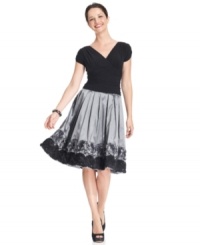 SL Fashions re-imagines the classic A-line party dress with pretty touches like ruching and floral embellishments at the hem. SL Fashions re-imagines the classic A-line party dress with pretty touches like ruching and floral embellishments at the hem.