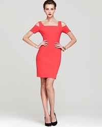 Show a subtle flash of skin in BCBGMAXAZRIA's Ann dress, detailed with open shoulders and rendered in a bold shade of lipstick red. Show a subtle flash of skin in BCBGMAXAZRIA's Ann dress, detailed with open shoulders and rendered in a bold shade of lipstick red.
