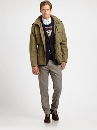 Welcome winter in style with this stylish parka silhouette, rendered in cotton with military-inspired details, for a finished look that is both functional and fashionable.Zip frontStand collarShoulder epaulettesChest, waist flap pocketsDrawstring waistAbout 29 from shoulder to hemCottonDry cleanImported Welcome winter in style with this stylish parka silhouette, rendered in cotton with military-inspired details, for a finished look that is both functional and fashionable.Zip frontStand collarShoulder epaulettesChest, waist flap pocketsDrawstring waistAbout 29 from shoulder to hemCottonDry cleanImported