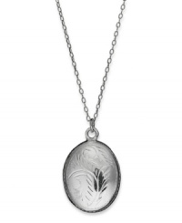 Keep memories safe in style. Giani Bernini's pretty etched locket features an oval shape and sterling silver setting. Approximate length: 19 inches. Approximate drop length: 1 inch. Approximate drop width: 1/2 inch.