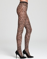 Expect to be spotted in these wild, leopard-print Wolford tights. Style #018905. Expect to be spotted in these wild, leopard-print Wolford tights. Style #018905.