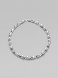 Lovely organic pearls and sparkling cubic zirconia accents blend in one gracious style. 10mm white round man-made pearls Cubic zirconia Rhodium-plated sterling silver Length, about 17 Push-lock clasp with mabé pearl accent Imported Lovely organic pearls and sparkling cubic zirconia accents blend in one gracious style. 10mm white round man-made pearls Cubic zirconia Rhodium-plated sterling silver Length, about 17 Push-lock clasp with mabé pearl accent Imported