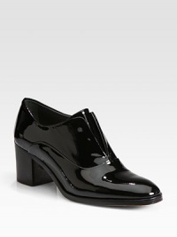 A stacked heel lifts this laceless patent leather staple. Stacked heel, 2½ (65mm)Patent leather upperLeather lining and solePadded insoleMade in Italy A stacked heel lifts this laceless patent leather staple. Stacked heel, 2½ (65mm)Patent leather upperLeather lining and solePadded insoleMade in Italy