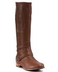 A refined equestrian silhouette by UGG® Australia, featuring a single buckle across the ankle. A refined equestrian silhouette by UGG® Australia, featuring a single buckle across the ankle.