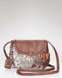 Undeniably day-to-night right, a smattering of sparkles dress up this UGG® Australia crossbody bag. Undeniably day-to-night right, a smattering of sparkles dress up this UGG® Australia crossbody bag.