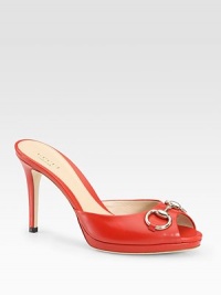 Classic leather silhouette with a low-cut front, silvertone horsebit detail and peep toe. Self-covered heel, 4 (100mm)Covered platform, ½ (15mm)Compares to a 3½ heel (90mm)Leather upperLeather liningBuffed leather solePadded insoleMade in ItalyOUR FIT MODEL RECOMMENDS ordering true size Classic leather silhouette with a low-cut front, silvertone horsebit detail and peep toe. Self-covered heel, 4 (100mm)Covered platform, ½ (15mm)Compares to a 3½ heel (90mm)Leather upperLeather liningBuffed leather solePadded insoleMade in ItalyOUR FIT MODEL RECOMMENDS ordering true size