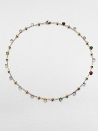 From the Paradise Collection. Faceted semi-precious stones on an 18k gold link chain with beautifully textured separators. May include amethyst, light amethyst, green amethyst, iolite, garnet, green garnet, orange garnet, tourmalines, citrine, lemon citrine, peridot, pink quartz, smoky quartz and topaz18k goldLength, about 18Lobster clasp closureMade in Italy