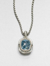 From the Labyrinth Collection. A stunning, faceted blue topaz stone surrounded by sparkling diamonds set in sleek sterling silver on an iconic cable bale. Blue topazDiamonds, .45 tcwSterling silverSize, about .7Fixed baleImported Please note: Chain sold separately. From the Labyrinth Collection. A stunning, faceted blue topaz stone surrounded by sparkling diamonds set in sleek sterling silver on an iconic cable bale. Blue topazDiamonds, .45 tcwSterling silverSize, about .7Fixed baleImported Please note: Chain sold separately.