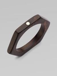 This geometric design features a natural wood body with a metal logo accent. WoodGoldtone zincDiameter, about 3.6Slip-on styleImported This geometric design features a natural wood body with a metal logo accent. WoodGoldtone zincDiameter, about 3.6Slip-on styleImported