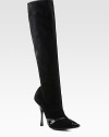 A sculpted boot in buttery suede with a hint of stretch and glossy patent leather trim. Lacquered heel, 4½ (115mm)Shaft, 16Leg circumference, 12½Stretch suede upper with patent leather trimPoint toePull-on styleLeather lining and solePadded insoleMade in Italy