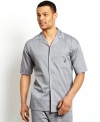 Top off your stylish sleepwear look with this herringbone camp shirt from Nautica.