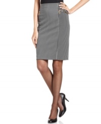 Alfani's alluring interpretation of the petite pencil skirt includes shiny gold zippered pockets and a houndstooth print. Alfani's alluring interpretation of the petite pencil skirt includes shiny gold zippered pockets and a houndstooth print.