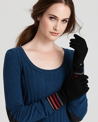SONIA RYKIEL puts a fun twist on the classic black glove with a cuff full of pink, red and gray stripes. SONIA RYKIEL puts a fun twist on the classic black glove with a cuff full of pink, red and gray stripes.