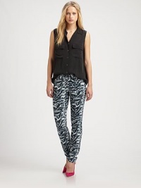 An ultra-slimming pair of skinny jeans in five-pocket styling with a notice-me silver tiger print.Front button closureWaistband with belt loopsZip flyFive-pocket styleRise, about 8Inseam, about 34Cotton/polyester/Lycra®Dry cleanMade in the USASIZE & FIT Model shown is 5'10 (177cm) wearing a US size 4. An ultra-slimming pair of skinny jeans in five-pocket styling with a notice-me silver tiger print.Front button closureWaistband with belt loopsZip flyFive-pocket styleRise, about 8Inseam, about 34Cotton/polyester/Lycra®Dry cleanMade in the USASIZE & FIT Model shown is 5'10 (177cm) wearing a US size 4.