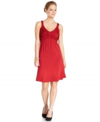 Chic detailing and an A-line silhouette make up a flattering petite dress from Spense! Pair with your favorite pumps for a graceful appeal. Chic detailing and an A-line silhouette make up a flattering petite dress from Spense! Pair with your favorite pumps for a graceful appeal.