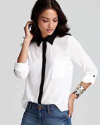 Tuck it in or wear it out, this stylish, color blocked Splendid shirt is versatile enough over your black skinny jeans for casual-chic and easy enough to dress up with a chic leather mini. Tuck it in or wear it out, this stylish, color blocked Splendid shirt is versatile enough over your black skinny jeans for casual-chic and easy enough to dress up with a chic leather mini.