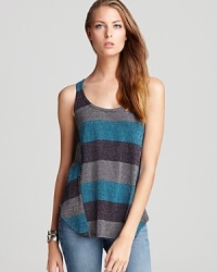 You'll be ready for the concert festival circuit in this Splendid loose striped tank. The racerback gives it a sporty feel while the shiny finish makes it fun and feminine. Pair it with jeans for a no-fail casual look. You'll be ready for the concert festival circuit in this Splendid loose striped tank. The racerback gives it a sporty feel while the shiny finish makes it fun and feminine. Pair it with jeans for a no-fail casual look.