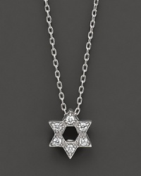 From the Tiny Treasures collection, a Star of David necklace makes a religious statement; with signature ruby accent. Designed by Roberto Coin. From the Tiny Treasures collection, a Star of David necklace makes a religious statement; with signature ruby accent. Designed by Roberto Coin.