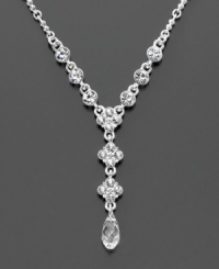 Elevate your style with a glamourous crystal cluster Givenchy necklace in silvertone. Length measures 17 inches with 3 inch extender at back and 2-1/2 drop at front. Elevate your style with a glamourous crystal cluster Givenchy necklace in silvertone. Length measures 17 inches with 3 inch extender at back and 2-1/2 drop at front.