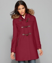 Tommy Hilfiger updates a classic toggle-front coat with a detachable faux-fur-trimmed hood for chic twist on a timeless look. Tommy Hilfiger updates a classic toggle-front coat with a detachable faux-fur-trimmed hood for chic twist on a timeless look.