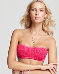 Interchangeable swimwear is a must for the seasoned sunbather, and this solid smocked bandeau top from Juicy Couture is a playful way to be a mix and match master. Interchangeable swimwear is a must for the seasoned sunbather, and this solid smocked bandeau top from Juicy Couture is a playful way to be a mix and match master.