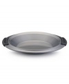 Create perfect pies with the professional-grade features of Anolon's 9 pie pan. New proprietary coating ensures superior release and makes cleanup a snap. Silicon-enhanced handles are steady and slip-free, while the pan's substantial weight provides durability and helps prevent warping.