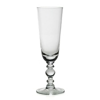 A clean, contemporary silhouette formed of eye-catching crystal makes this champagne flute from William Yeoward a charming addition to any celebration. A clean, contemporary silhouette formed of eye-catching crystal makes this champagne flute from William Yeoward a charming addition to any celebration.