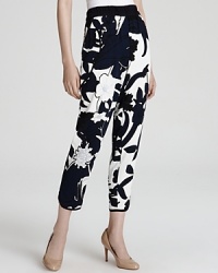 An easy silhouette that moves from work to weekend, these Escada trousers flaunts a lovely floral pattern that welcomes spring with chic abandon. An easy silhouette that moves from work to weekend, these Escada trousers flaunts a lovely floral pattern that welcomes spring with chic abandon.