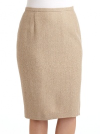 THE LOOKAllover woven herringbone constructionBanded waistBack zip closureVented back hemTHE FITAbout 33 from waist to hemTHE MATERIALWool/camel/spandexFully linedCARE & ORIGINDry cleanImported THE LOOKAllover woven herringbone constructionBanded waistBack zip closureVented back hemTHE FITAbout 33 from waist to hemTHE MATERIALWool/camel/spandexFully linedCARE & ORIGINDry cleanImported
