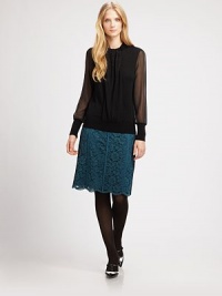 A cozy-chic wool sweater with an intriguing neckline and silk sleeves.Sheer sleevesRibbed-knit cuffsConcealed back zipperFully linedAbout 25 from shoulder to hemBody: woolSleeves and trim: silkDry cleanImported Model shown is 5'10 (177cm) wearing US size Small. This style runs true to size. We recommend ordering your usual size for a standard fit. A cozy-chic wool sweater with an intriguing neckline and silk sleeves.Sheer sleevesRibbed-knit cuffsConcealed back zipperFully linedAbout 25 from shoulder to hemBody: woolSleeves and trim: silkDry cleanImported Model shown is 5'10 (177cm) wearing US size Small. This style runs true to size. We recommend ordering your usual size for a standard fit.