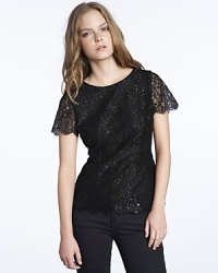 A gorgeous metallic lace Velvet by Graham & Spencer tee flaunts the reigning trend of the season with an intricate design and elegant scalloped hem. A gorgeous metallic lace Velvet by Graham & Spencer tee flaunts the reigning trend of the season with an intricate design and elegant scalloped hem.