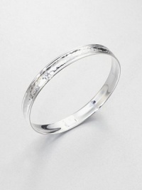 A narrow sterling silver style with an elegant hammered design, perfect for stacking or on it's own. Sterling silverDiameter, about 2.5Slip-on styleImported A narrow sterling silver style with an elegant hammered design, perfect for stacking or on it's own. Sterling silverDiameter, about 2.5Slip-on styleImported
