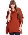 Snuggle up in Extra Touch's plus size poncho sweater, finished by a cowl neckline.