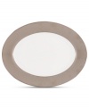 Draped in sumptuous metal, the Platinum Voile oval platter evokes the luxurious woven fabrics in Donna Karan's ready-to-wear collection. A simple etched pattern contrasts its brilliant sheen for a look as chic as anything on the runway.
